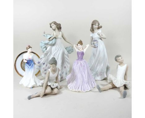 A collection of Lladro and Doulton figures of ladies