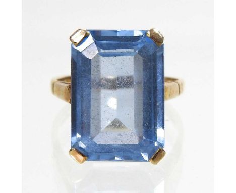 A 9 carat gold blue topaz dress ring, set with a baguette cut stone, approximately 18 x 12mm, 6.9g gross, size P, boxedOveral