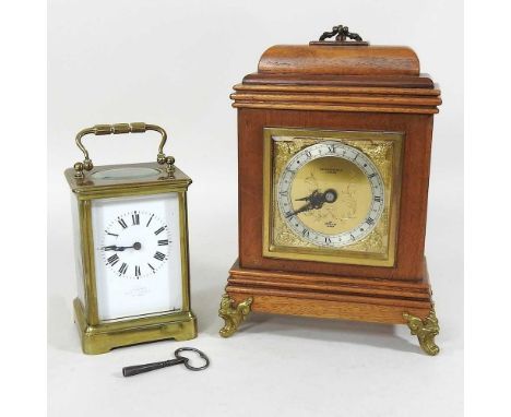 An early 20th century brass cased carriage clock, 14cm high, together with a walnut cased mantel clock, by Mappin &amp; Webb 