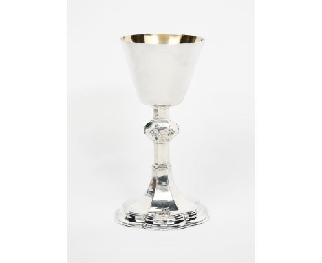A Guild of Handicraft silver chalice by George Hart, raised hexafoil base with raised Gothic cross motif, the hexagonal secti