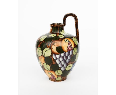 An early  Bursley Ware Pomona vase designed by Charlotte Rhead, pattern no.456, shouldered form with loop handle, tubeline de