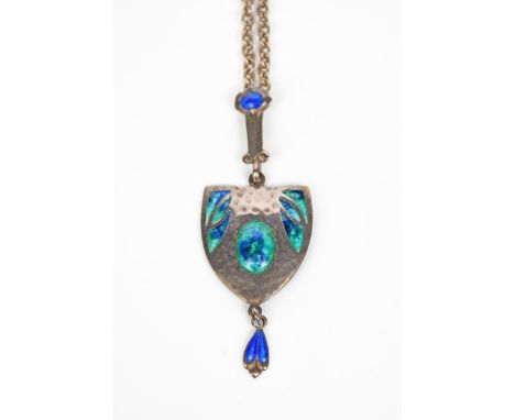 A James Fenton silver and enamel pendant necklace, shield shaped, cast in low relief with panels enamelled in blue and green,