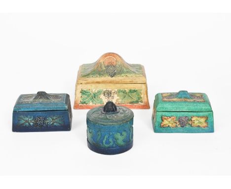 A Potters Art Guild Compton Pottery box and cover,  rectangular section, cast in low relief with grape vine panels, in shades