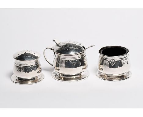 A Liberty &amp; Co silver cruet set, swollen form, stamped with triangular geometric band, the hinged cover with a sunflower 