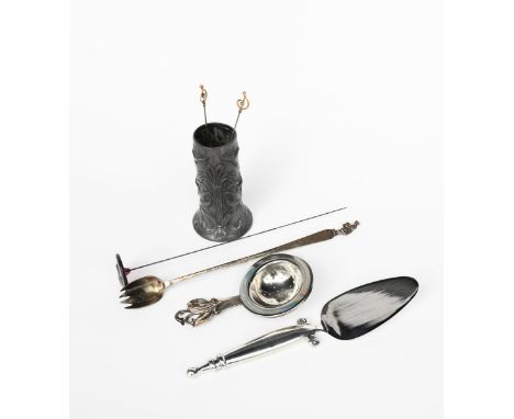 A Danish silver handled tea strainer, the handle cast with foliate terminal, a silver pill box cast in low relief with a hors