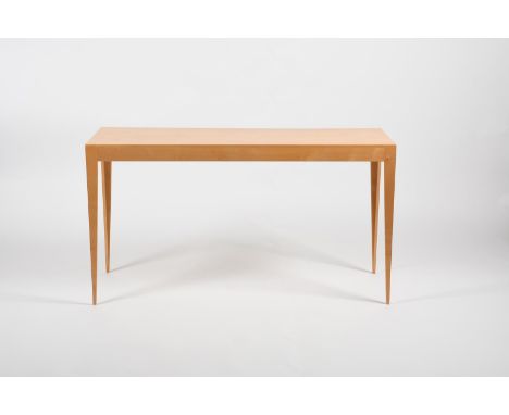 A Benchmark stiletto sycamore console table designed by Sir Terrence Conran, dated 2009, model no.1923,  slender rectangular 