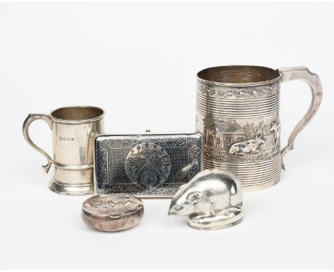 A silver snuff box modelled as a mouse, with hinged cover, a niello cigarette case, a silver tankard, two napkin rings, a sma