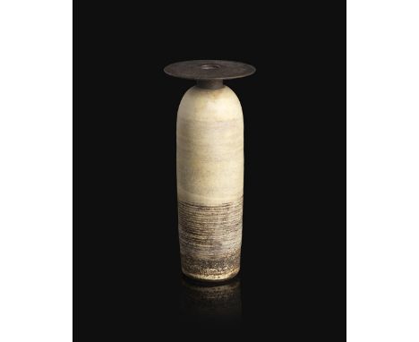 ‡Hans Coper (1920-1981) Bottle with Disc top, circa 1973 stoneware with layered slips and engobes over a body with textured a