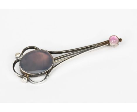 A George Hunt silver bar brooch, trefoil wirework frame set with large grey agate, flanked by two small paste, the tail set w
