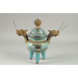 A FINE CHINESE BLUE GROUND CLOISONNE TRIPOD CENSER AND COVER, with twin dragon-head brass handles