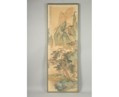 A LARGE CHINESE SCROLL PANTING OF A MOUNTAINOUS LANDSCAPE, inscribed and with four red seal marks, framed and glazed, 128cm x