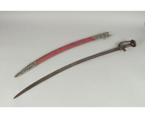 A 19TH CENTURY INDIAN TULWAR SWORD AND SCABBARD, the associated scabbard with silver chape and locket inlaid with very fine e