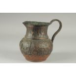 AN UNUSUAL CHINESE COPPER JUG, 18.5cm high.