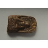 A SMALL 19TH CENTURY TIBETAN BUDDHISTIC AMULET, 6cm x 3.5cm.