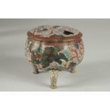 A CLOISONNE TRIPOD CENSER AND COVER, decorated with foo dogs and stylised clouds, 10cm high.