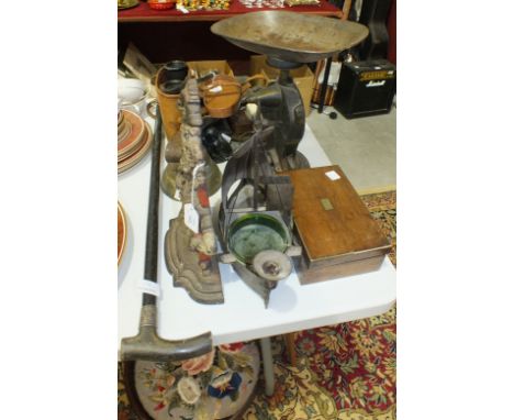 A Late-Victorian cast iron Mr Punch door stop with indistinct maker's mark to rear, 31cm high, a metal candle holder/ash tray