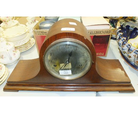 A Junghans oak-cased chiming mantel clock movement stamped 'A42', 24cm high.