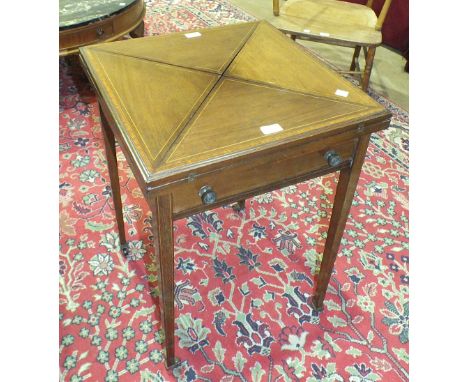 An Edwardian inlaid mahogany envelope-top card table fitted with a frieze drawer, on square tapering legs, 51cm square, 74cm 
