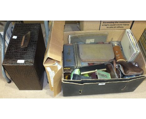 A pair of Wray 8x30 binoculars in case, a Viewmaster stereoscope, two Polaroid cameras, 78RPM records and miscellaneous items