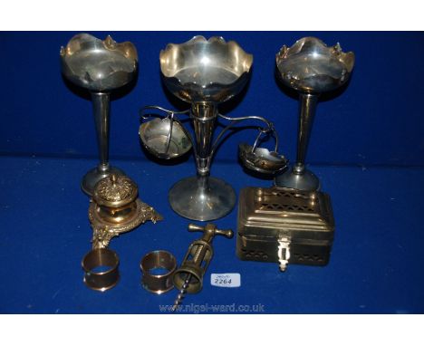 A quantity of metalware to include bud vases, corkscrew, inkwell, napkin rings, etc