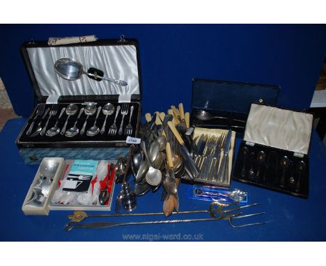 A quantity of boxed and loose Cutlery including knives with fiberloid blade dated 1955, teaspoons, toasting fork, etc