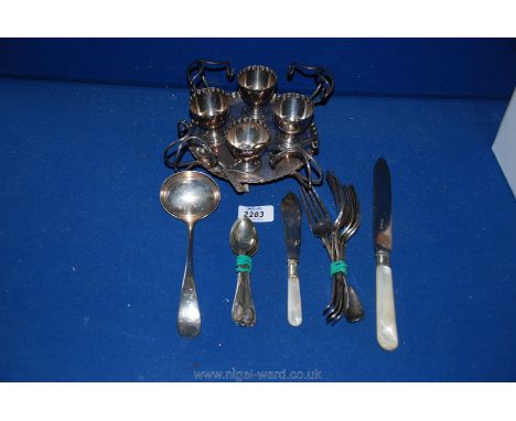 Miscellaneous silver plated forks, ladle, teaspoons, egg cups, etc.,