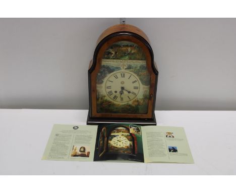 A walnut cased German mantle clock 