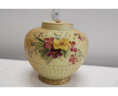 A Royal Worcester blush ivory and gilt jug with hand painted flowers stamped 1094 to the base 