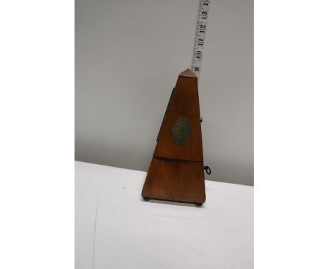 A vintage walnut cased Metronome 
