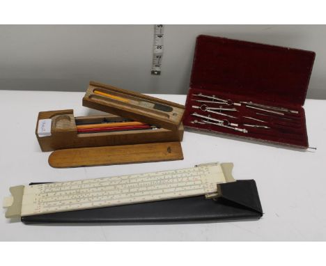 A vintage wooden pencil case &amp; technical drawing instruments 