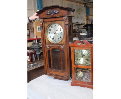 Two vintage wooden cased wall clocks, larger one converted for battery use a/f postage unavailble 