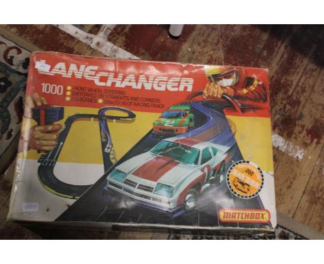 A vintage Matchbox 'Lane Changer' racing set 