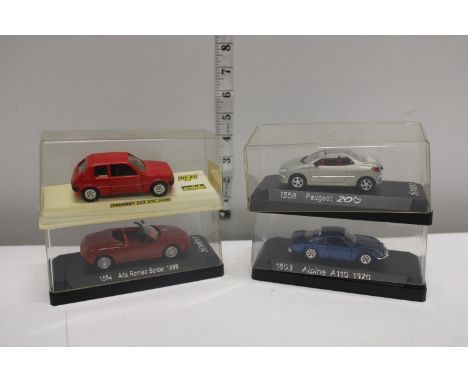 Four boxed Solido die-cast models 