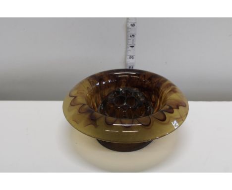 A vintage smoked glass posy holder 