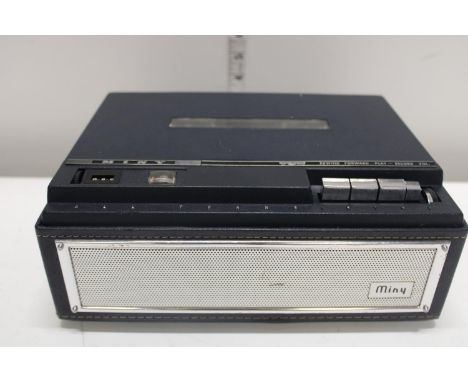 A vintage portable Miny reel to reel player 