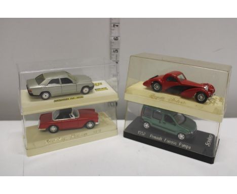 Four boxed Solido die-cast models 
