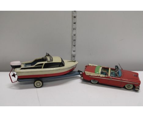 A vintage Japanese tinplate car with boat &amp; trailer&nbsp;- car length 21.5cm, total length 45cm