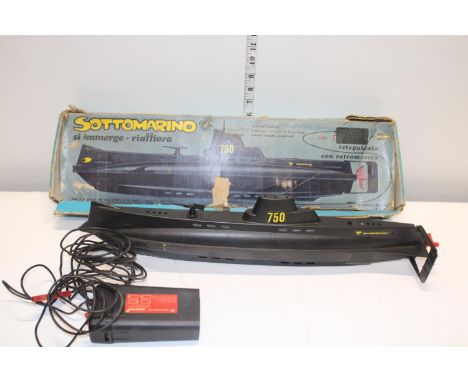 A vintage boxed Italian made submarine 