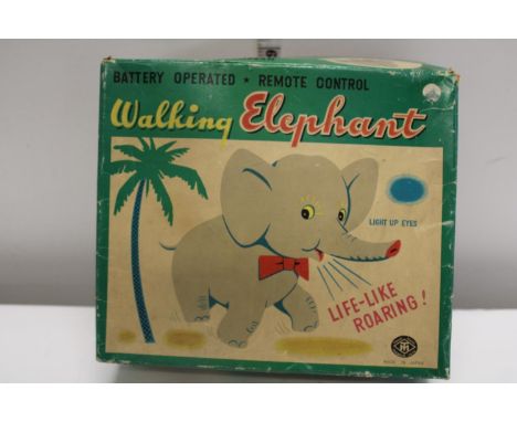 A vintage boxed remote controlled Walking Elephant 