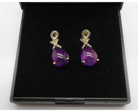 A pair of silver gilt, amethyst and diamond earrings