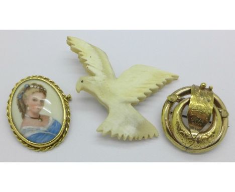 A pinchbeck brooch, a portrait brooch and an eagle brooch, (3)
