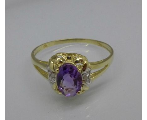 A 9ct gold, amethyst and diamond ring, 1.1g, O