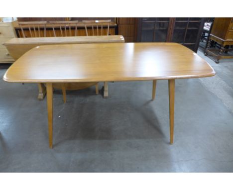 An Ercol Blonde Windsor dining table 