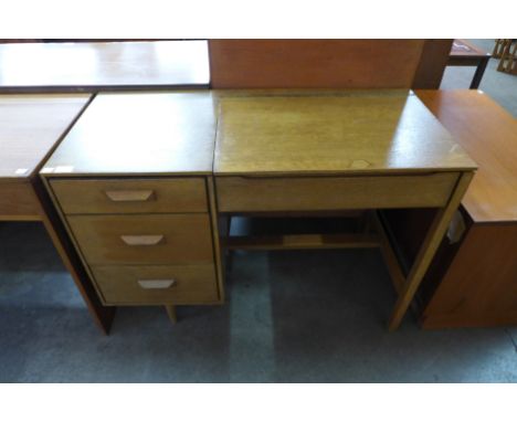 A Stag light oak dressing table 