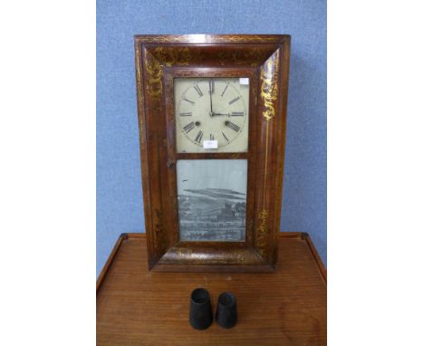 A 19th Century American mahogany ogee wall clock, by Chauncey Jerome 