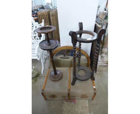 An oak barleytwist stick stand, smokers stand, oval mirror and a steamer trunk 