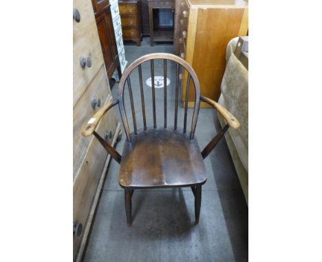 An Ercol dark Winsdor elbow chair 