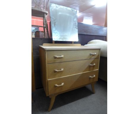 A light oak dressing chest 