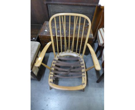 An Ercol Blonde Windsor low armchair 