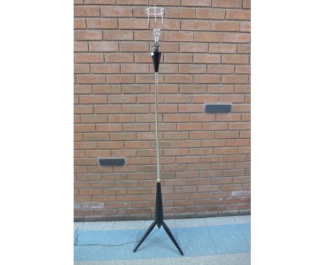 An ebonised and chrome tripod standard lamp 